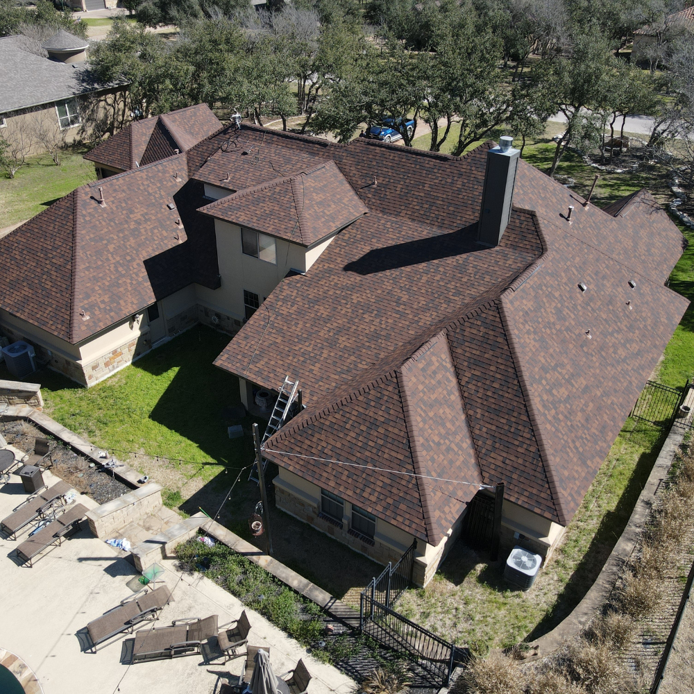 Completed brown architectural shingle installation